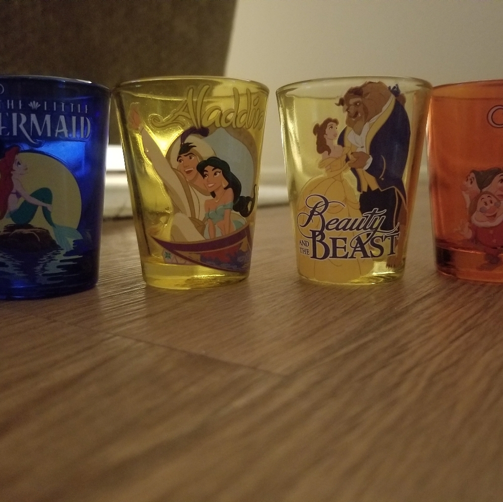4 Disney shot glasses